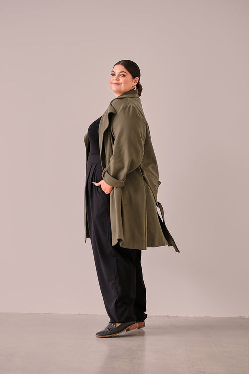 Bailey Wrap Jacket Moss — back view walking