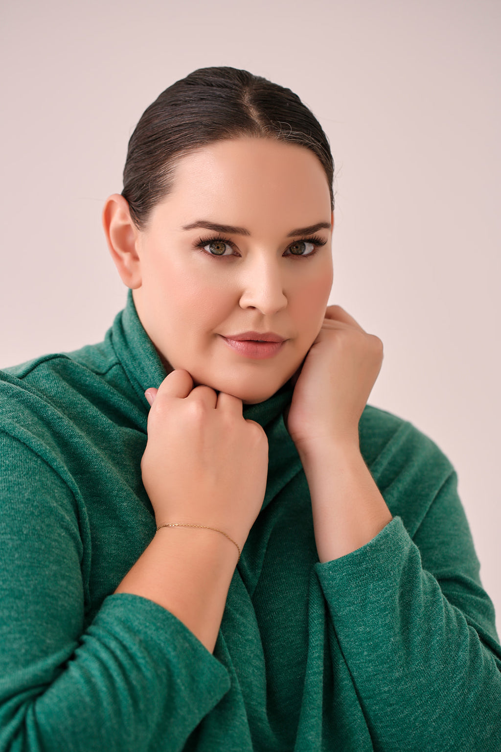 Montanna Knit Top Green — seated laughing